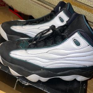 Green and black Boy Jordan 12s